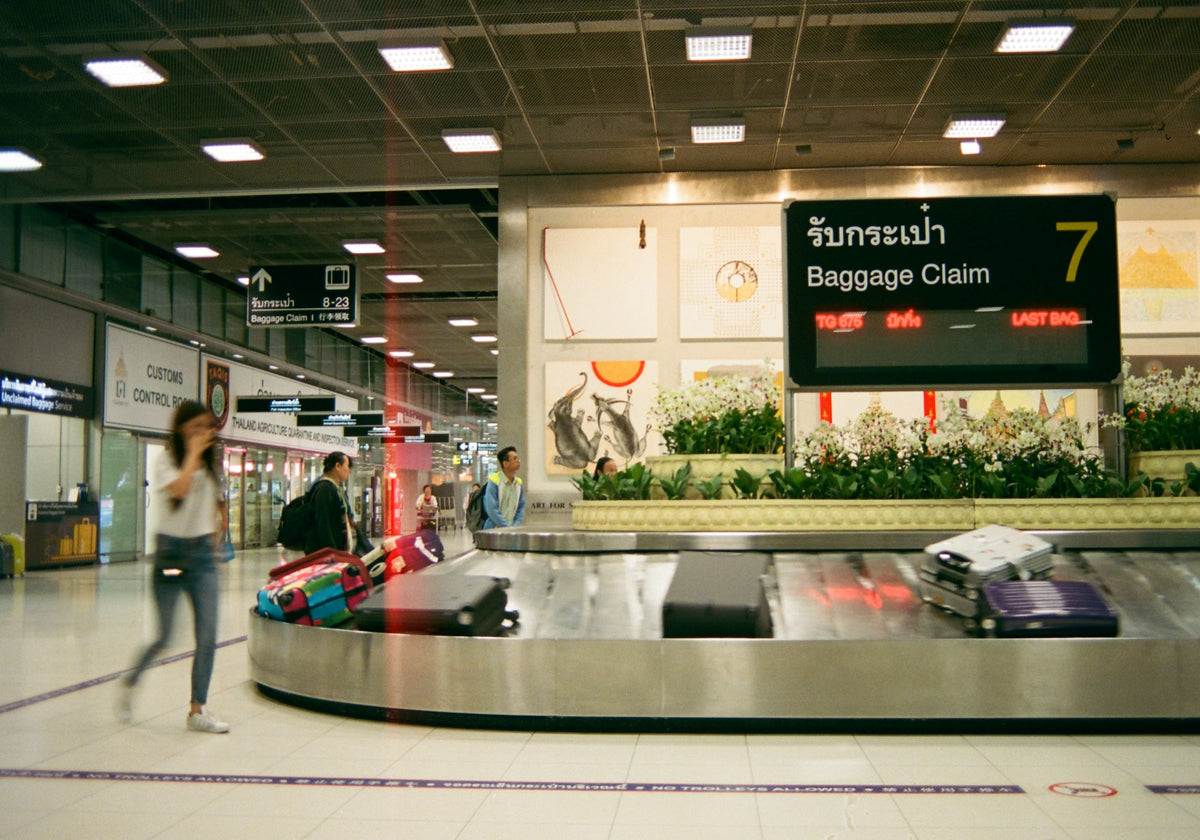 Passengers at an airport check-in hall
