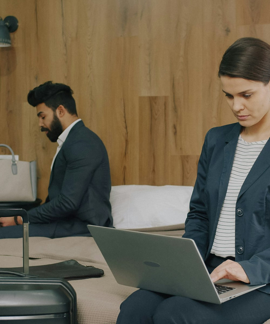 Professional relocating for work with a suitcase